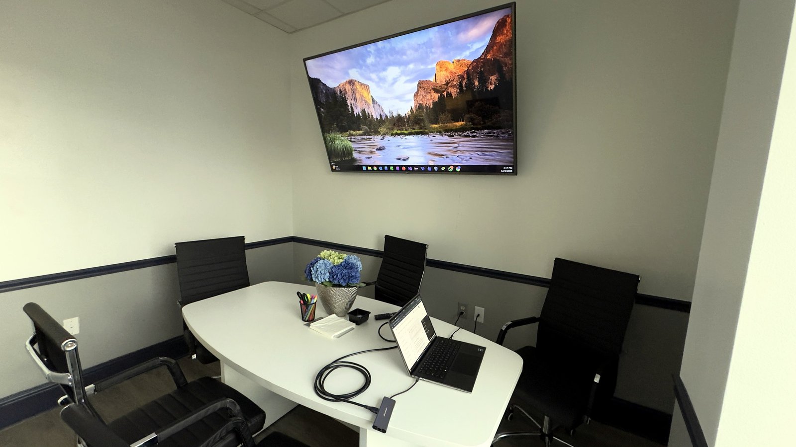 Conference room with a wall-mounted display